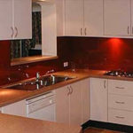 alt="Red kitchen splashback, Carterton"